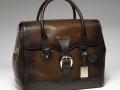 古馳-1921 collection- 泥黃色真皮手提旅行包，配鑰匙扣和帶“G.Gucci Firenze 1921”草體字金屬牌的標識牌
