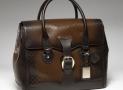 古馳-1921 collection- 泥黃色真皮手提旅行包，配鑰匙扣和帶“G.Gucci Firenze 1921”草體字金屬牌的標識牌