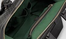 古馳-1921 collection- 深綠色真皮手提旅行包，配鑰匙扣和帶“G.Gucci Firenze 1921”草體字金屬牌的標識牌